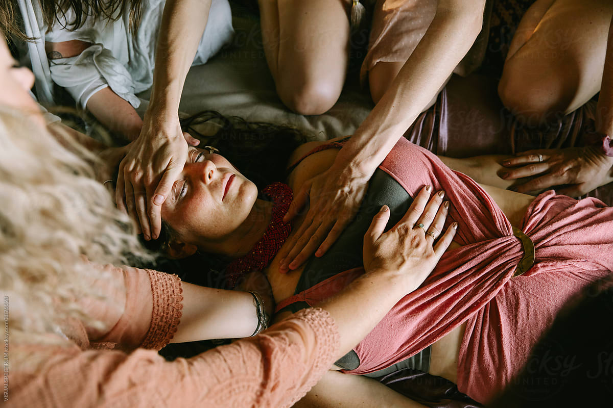 Woman Experiencing Tender Touch From Other Women