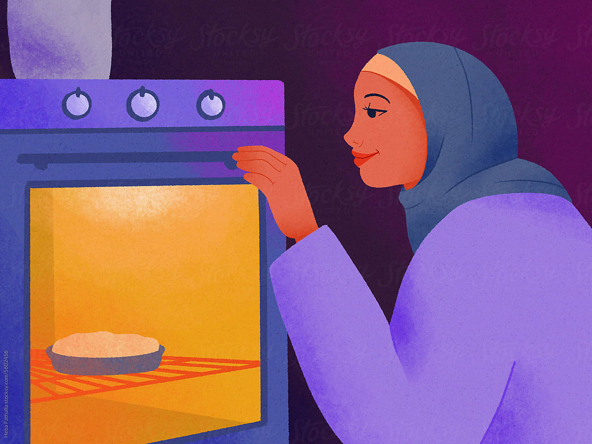 An Arab mother looks at the cake in the oven