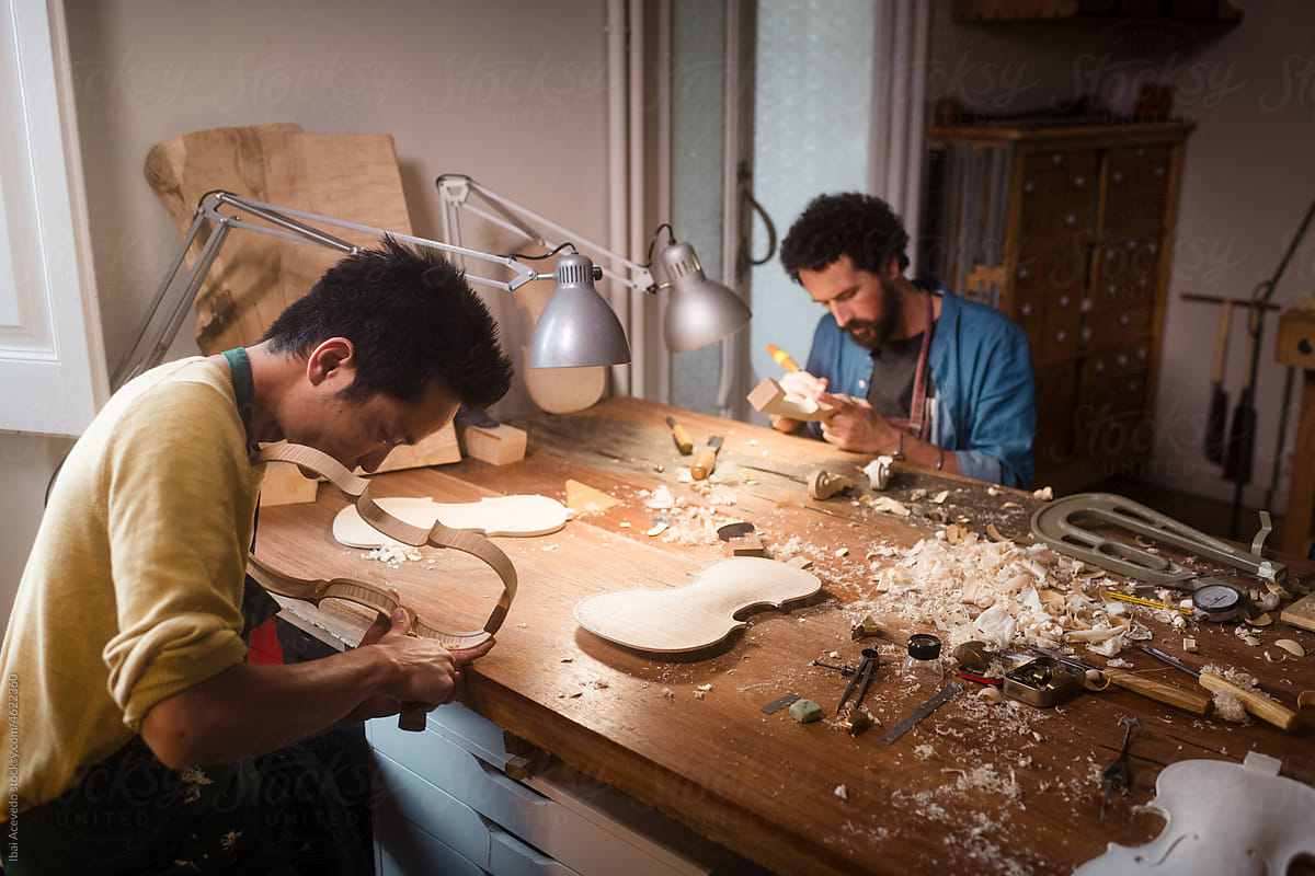 Focused luthiers creating finest violins