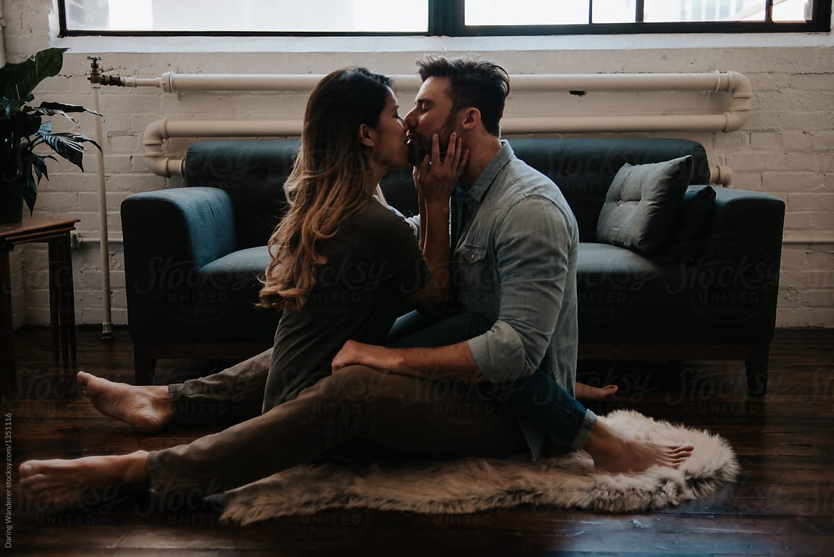 Attractive Young Interracial Couple In Trendy Loft Apartment By