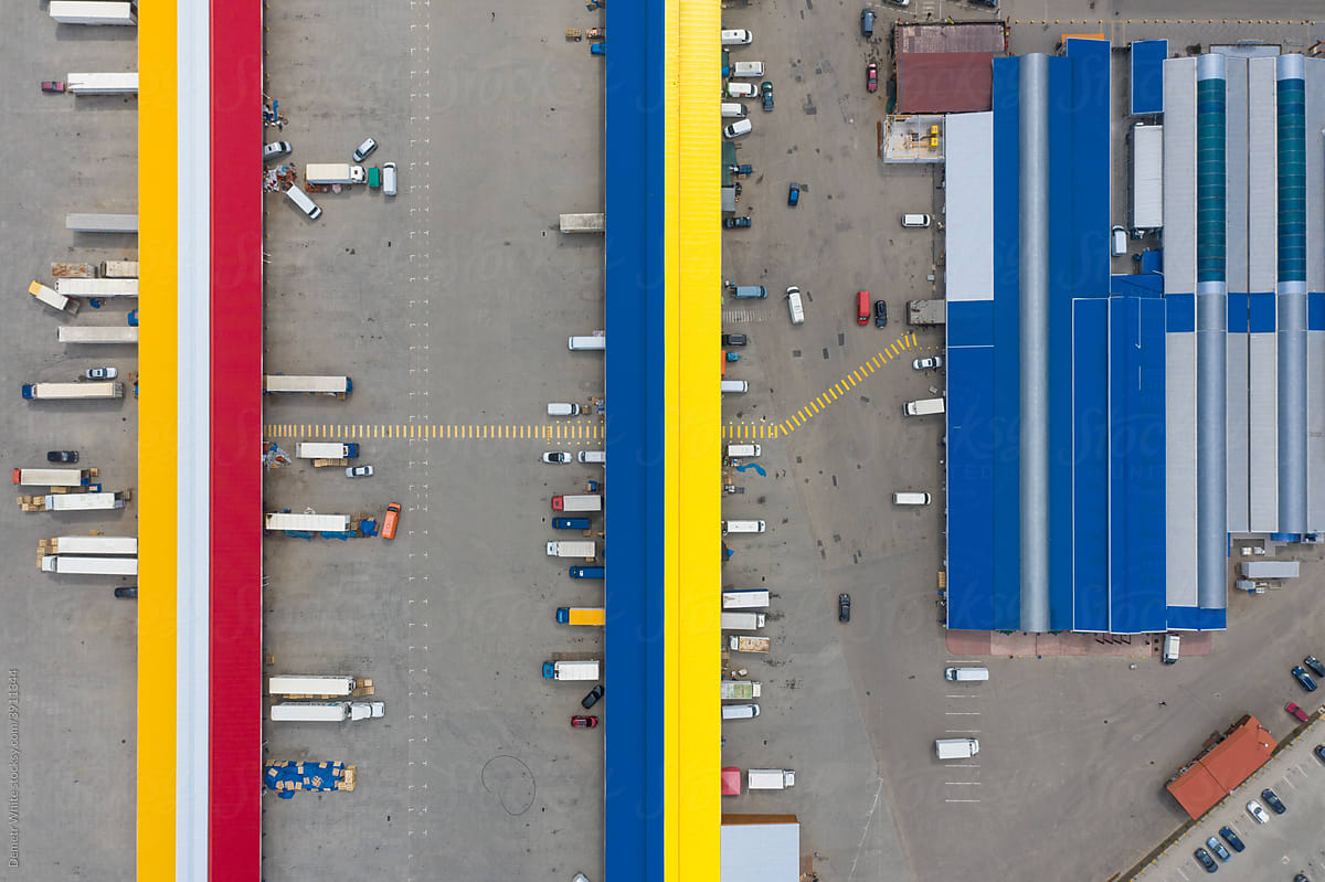 yellow-red and yellow-blue truck parking. view from above
