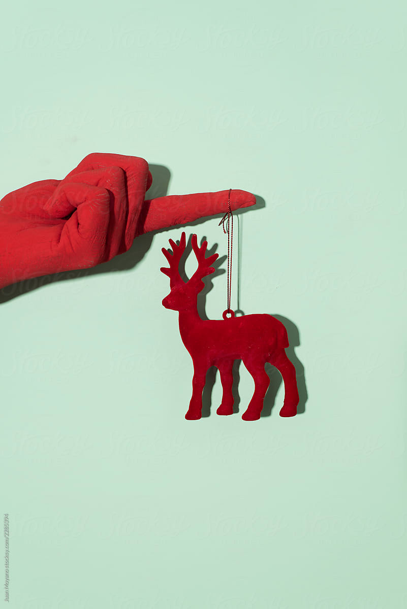 red hand with a red reindeer