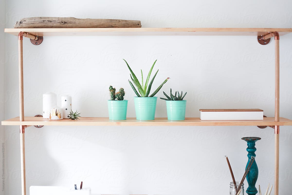 Simple decorated wood & copper shelving unit