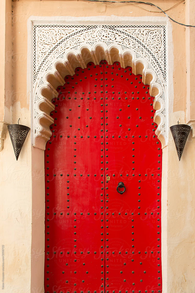 Red door with decorations of moroccan house