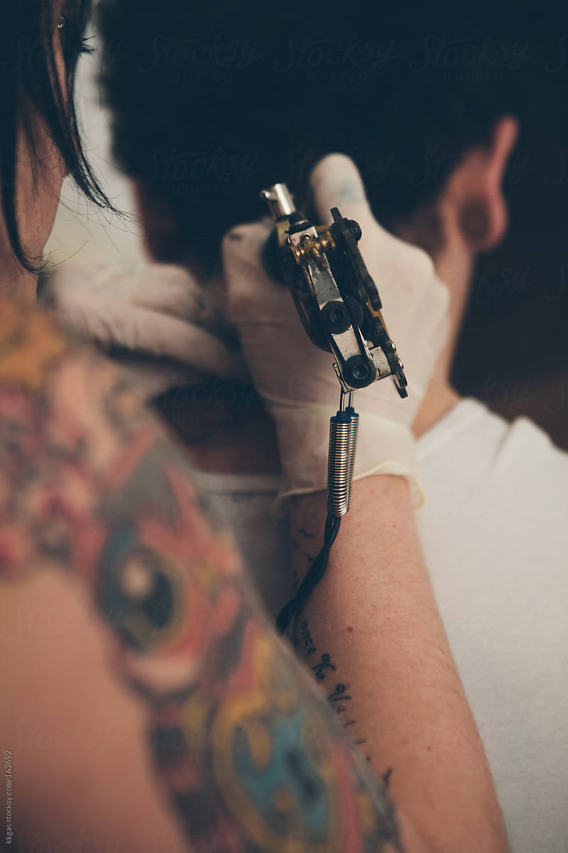 tattoo artist and customer