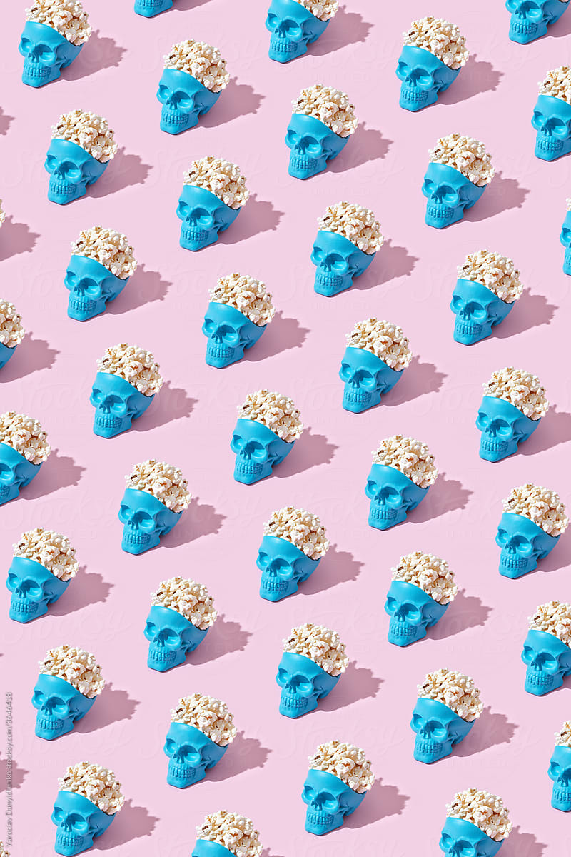 Popcorn in blue skulls flatlay