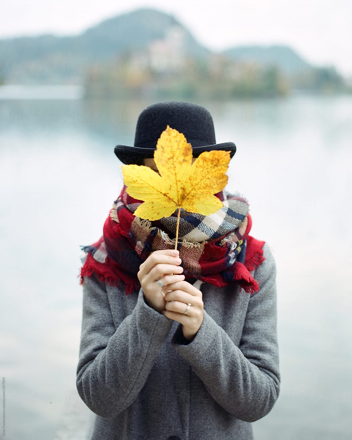 Female Covering Face With Maple Leaf By Stocksy Contributor Duet Postscriptum Stocksy 2152