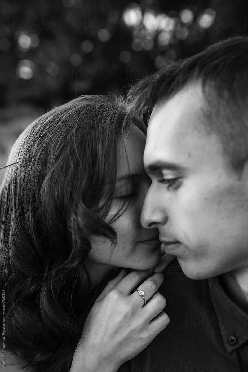 Close up photo of couple in love faces close to each other