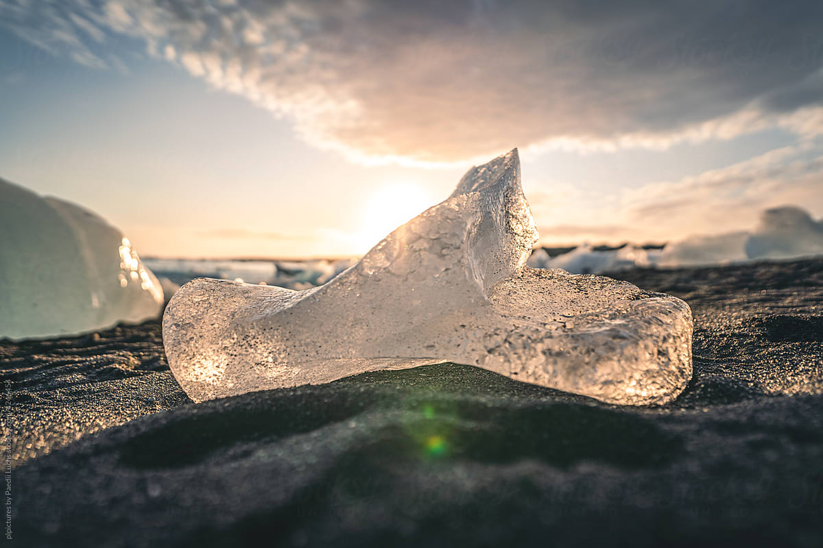 Chunk of ice in sunset light.