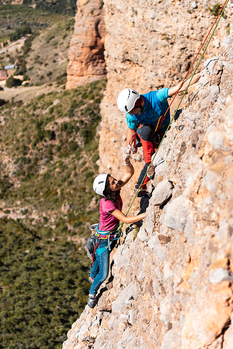Woman climber, woman rock climbing