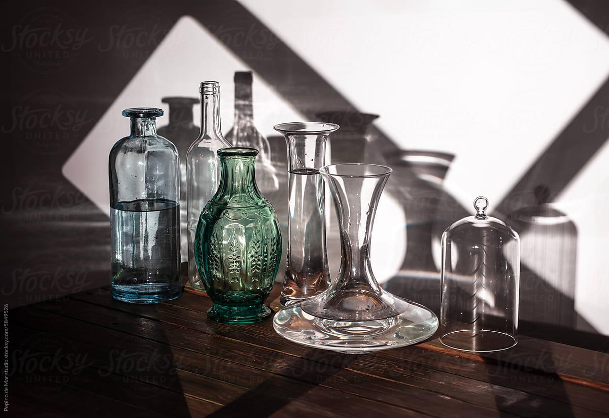 Variety of Glass Vessels on Wood