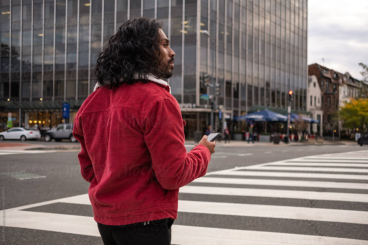 Man in front of a crosswalk