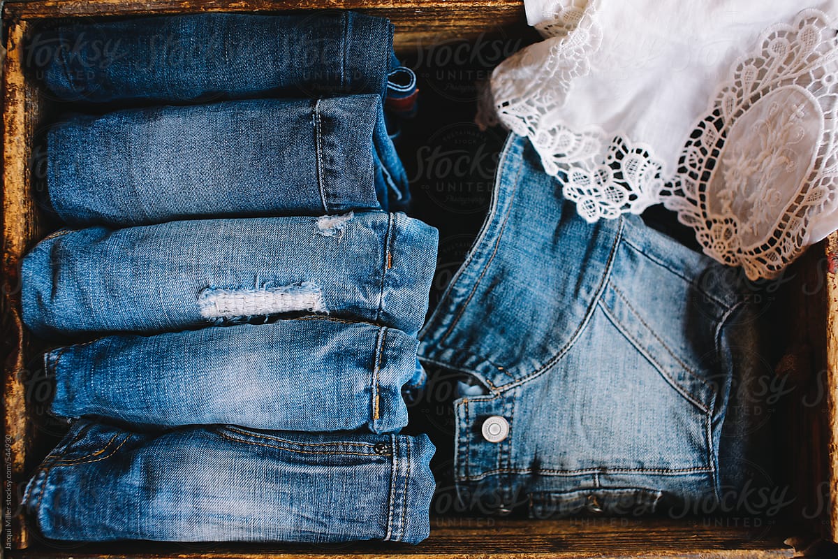 Selection of blue denim clothing with a lace shirt