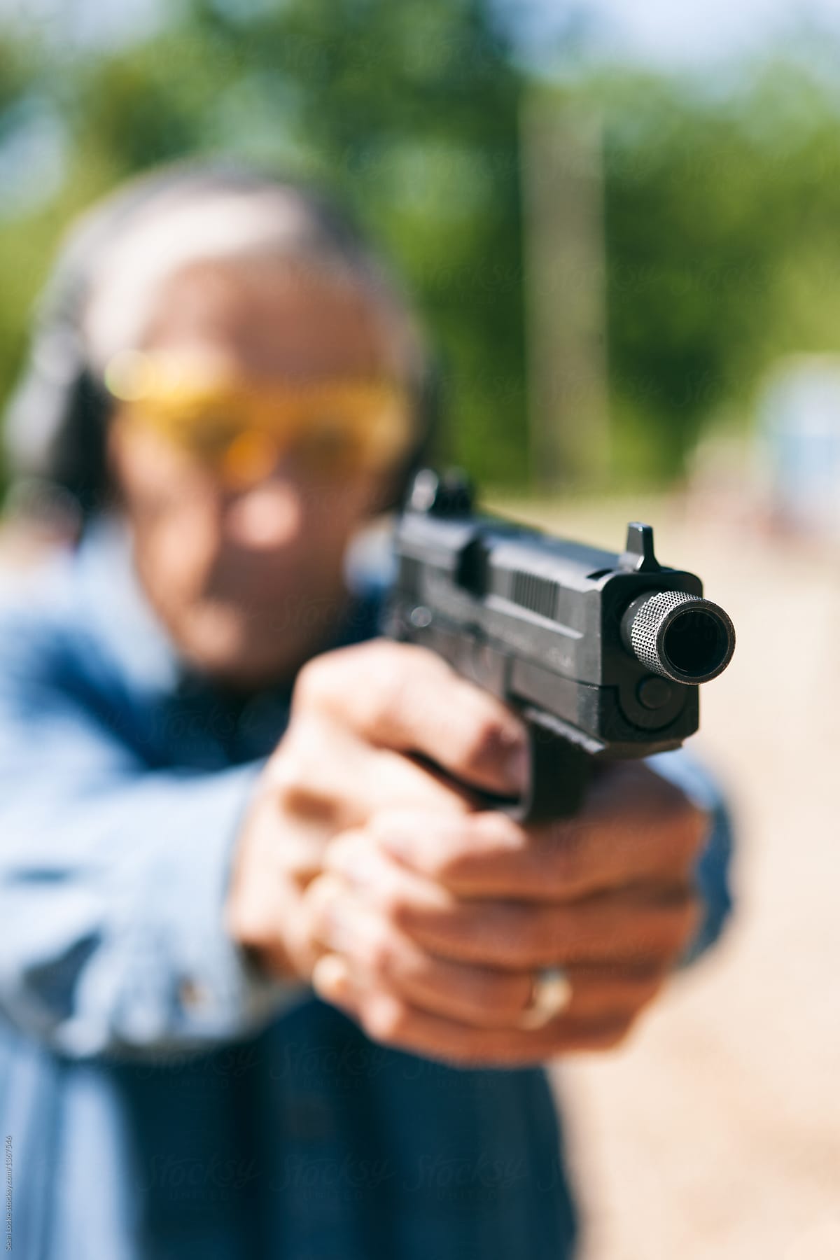 Shooting: Focus On Barrel Of Semi-Automatic Handgun