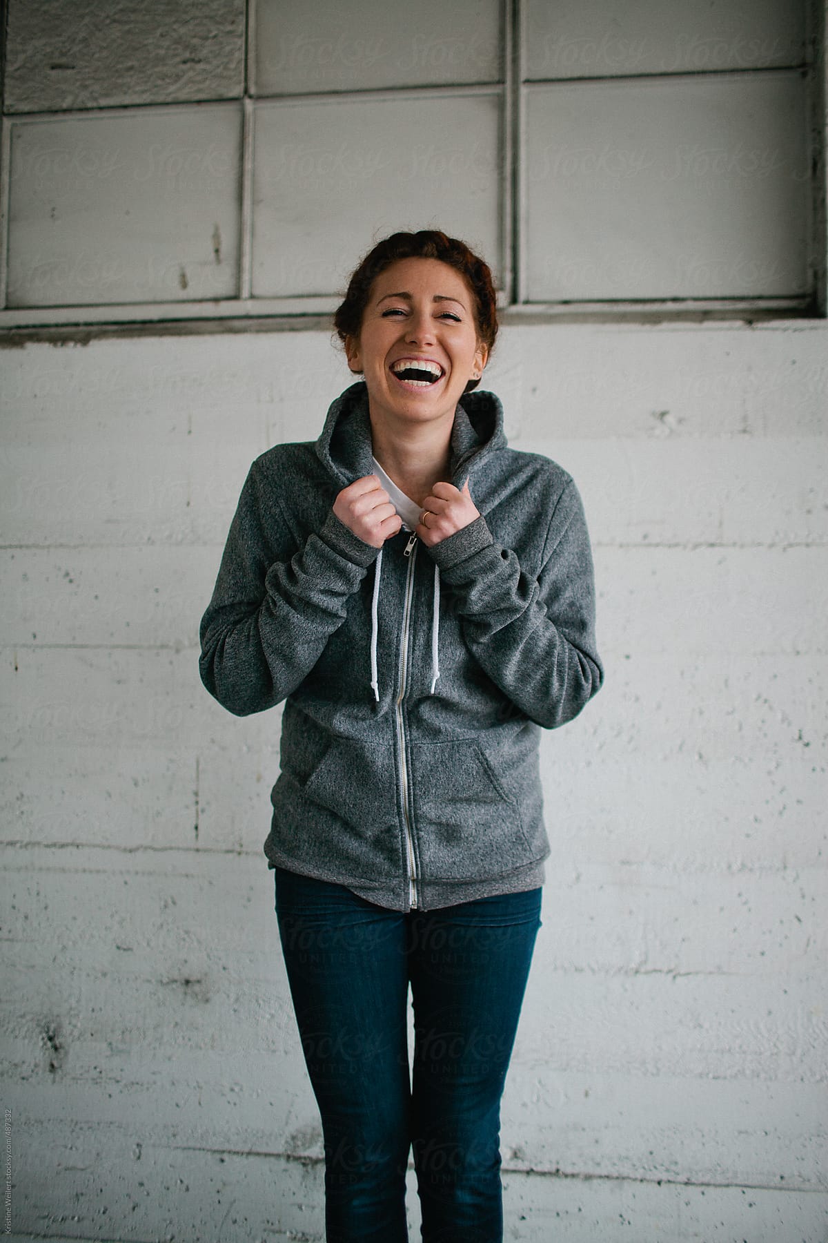 Woman in Gray Sweatshirt Laughing