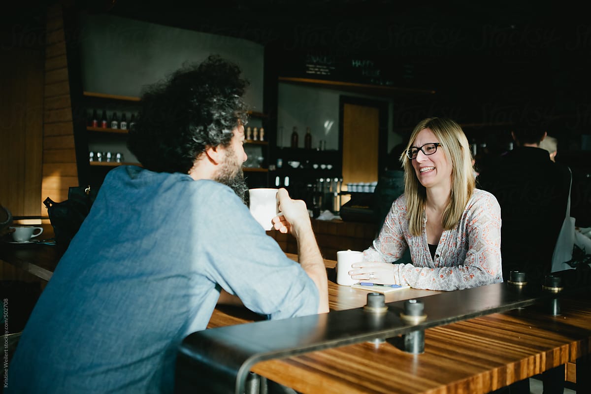 Man and Woman meeting over coffee