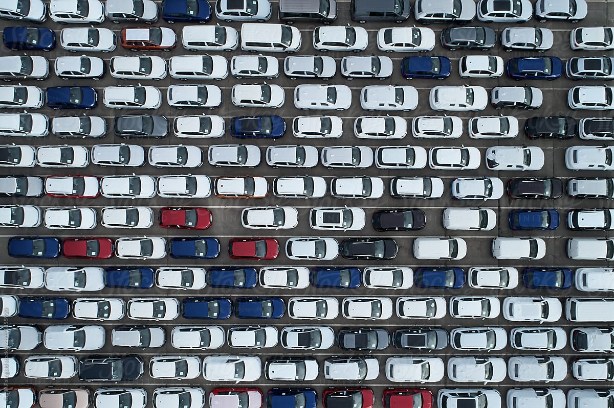 Lines of parked cars from above.