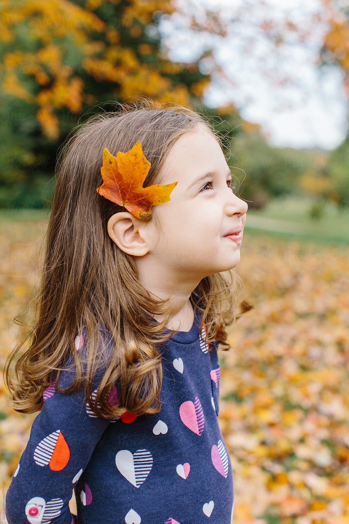Cute Young Girl With A Leaf Behind Her Ear By Stocksy Contributor 