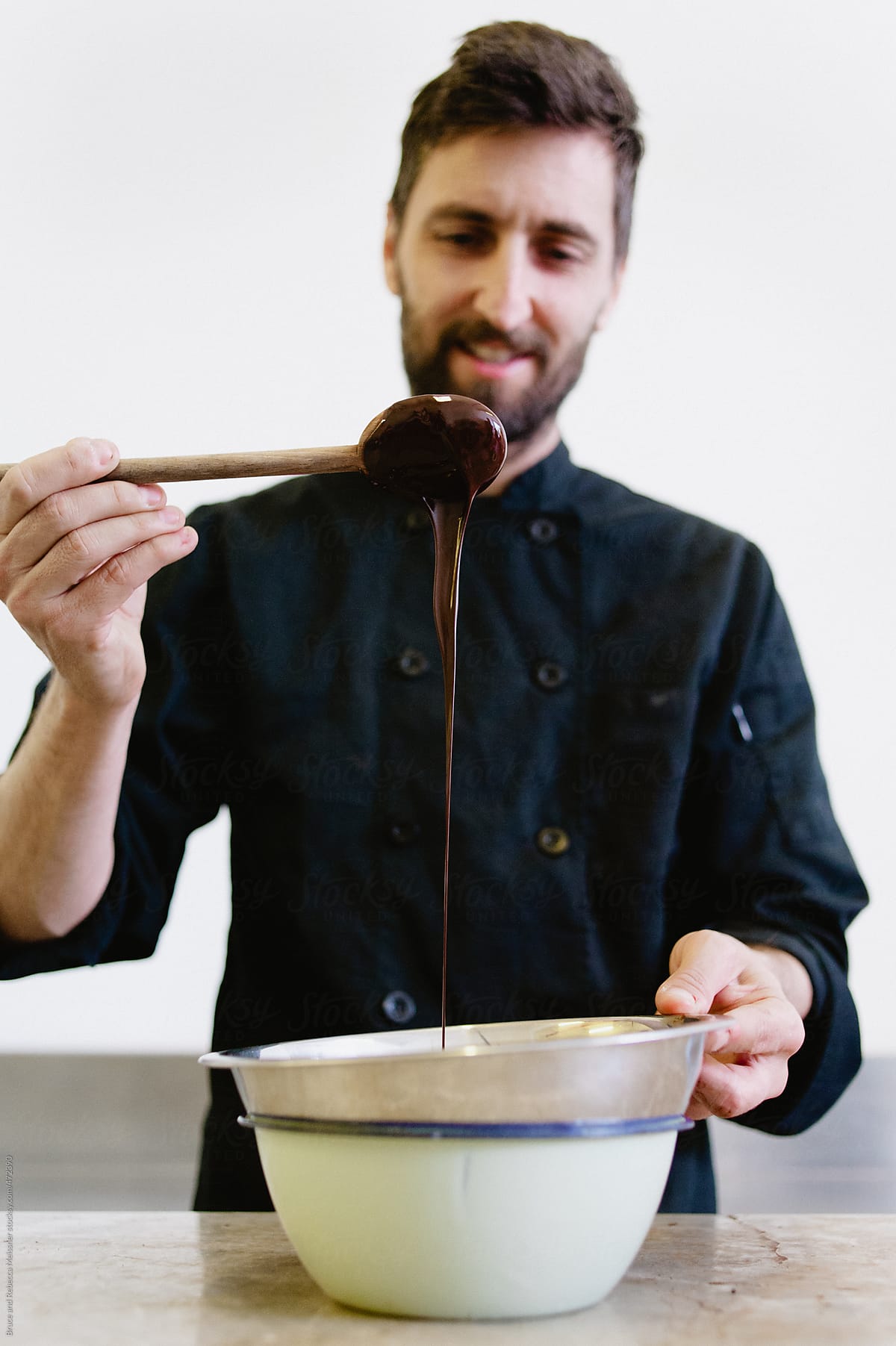 A Man Mixes Chocolate
