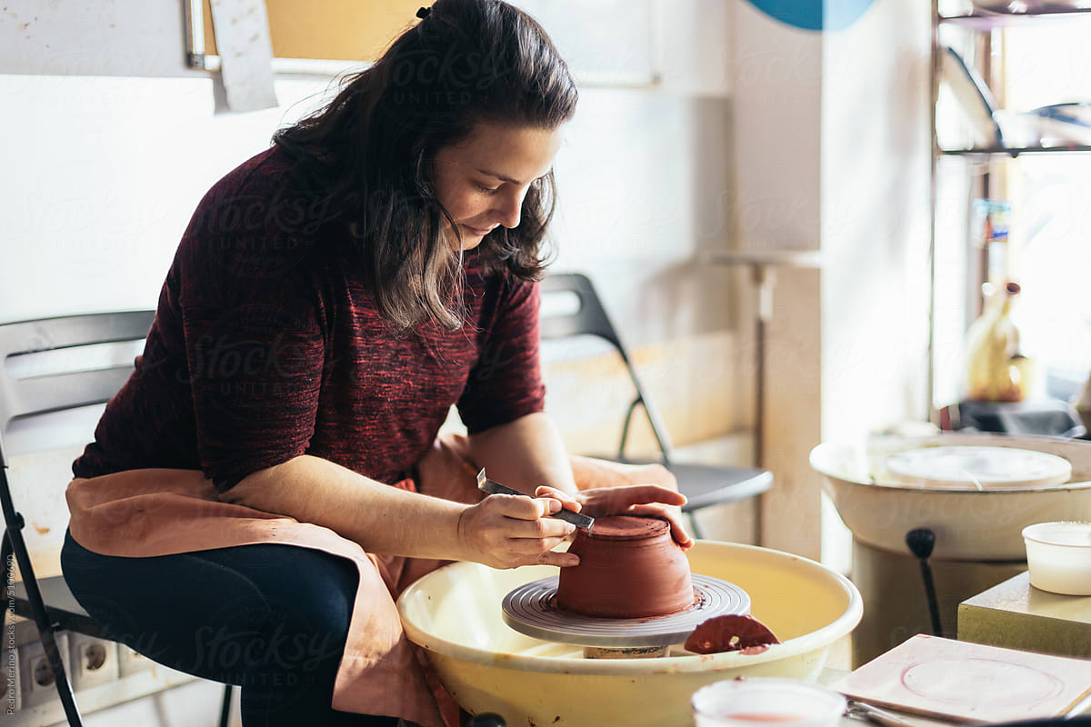 Craftswoman Making Clay Bowl