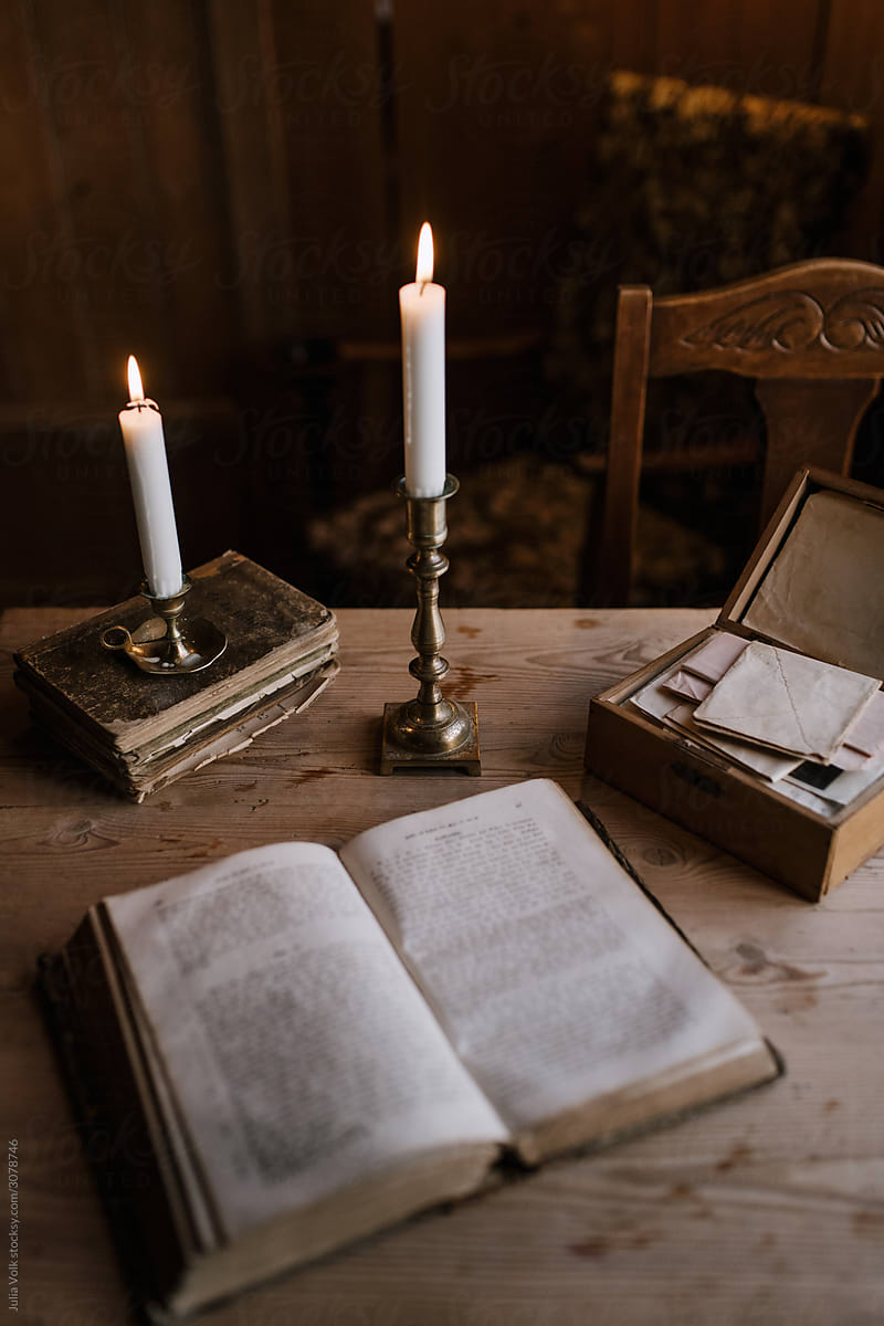 Still life of old books and candles
