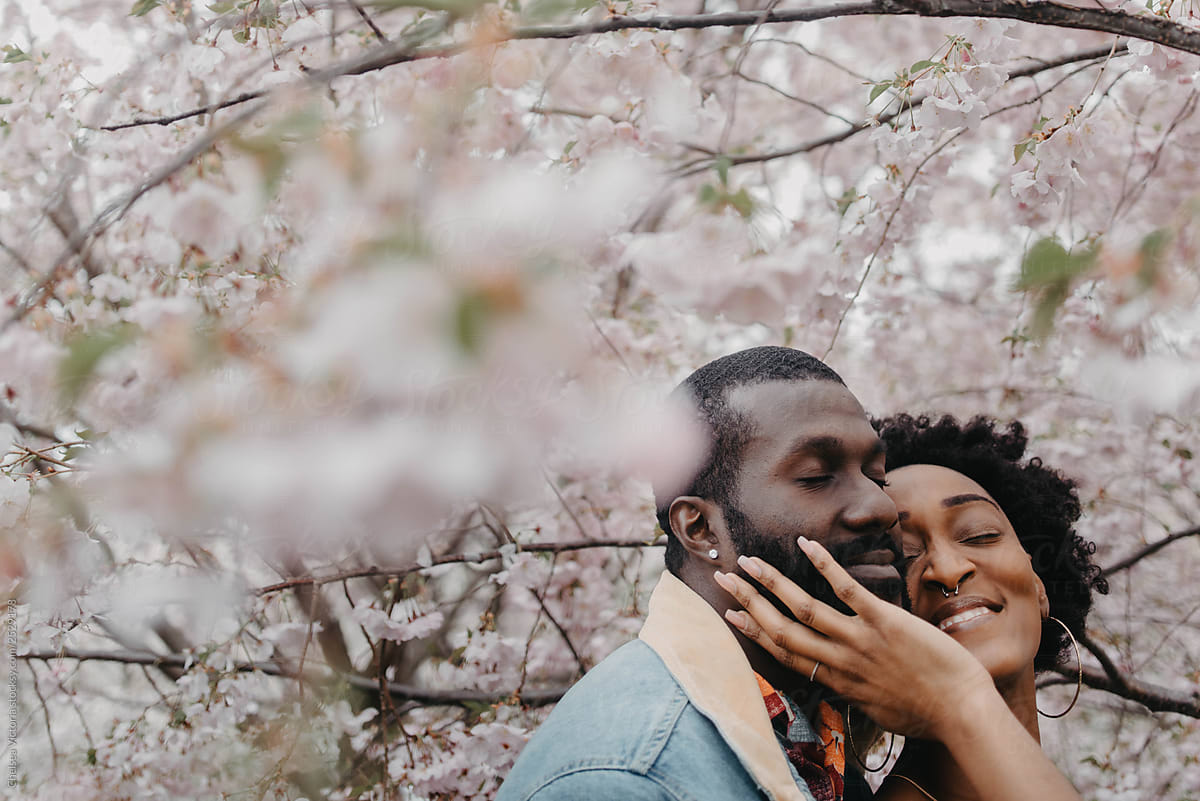 A beautiful black couple being affectionate