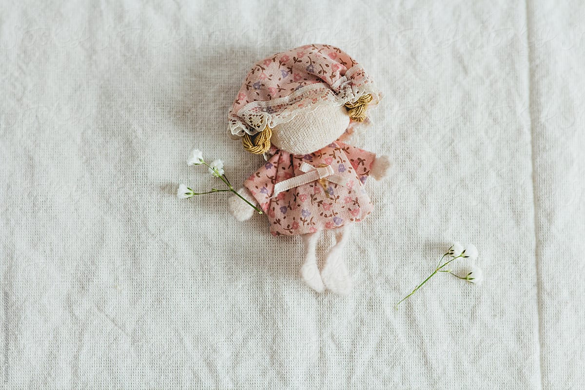 Handmade doll with flower