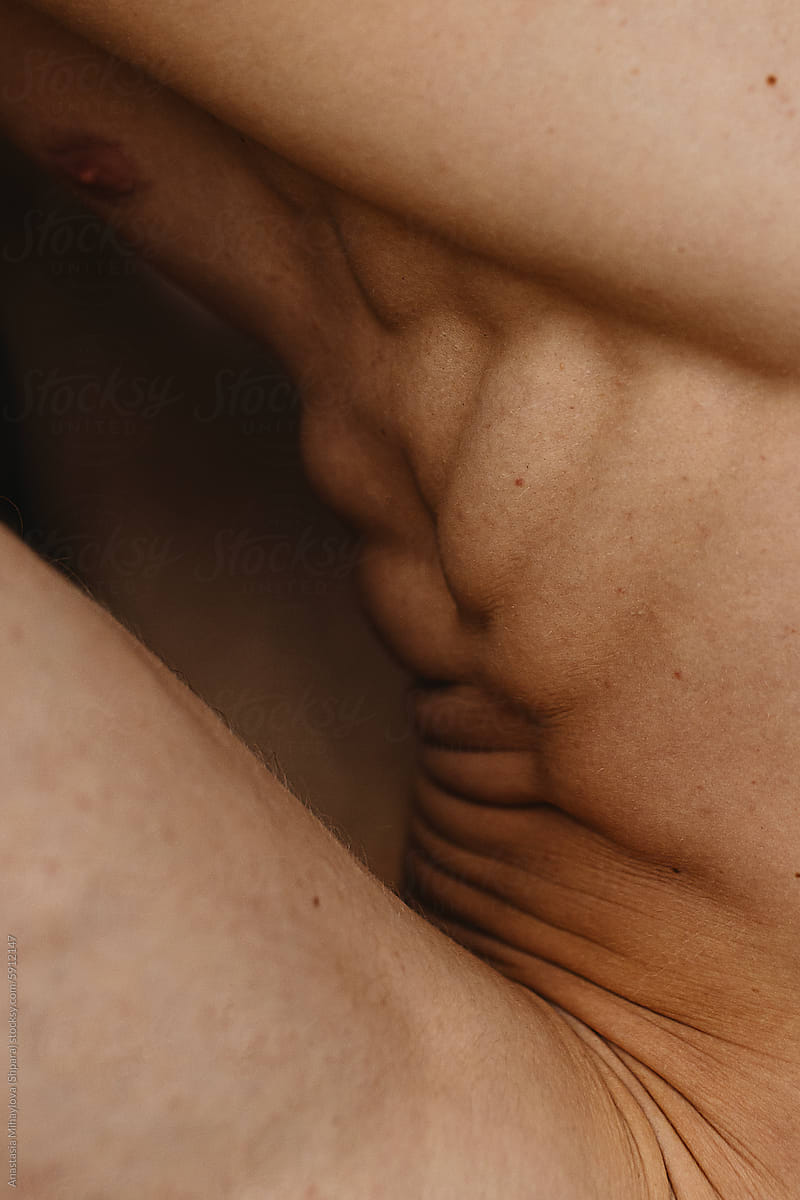 Close up Man bare-chested athlete, skin texture of torso of a man