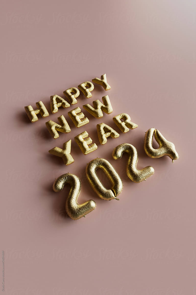 golden happy new year balloon text