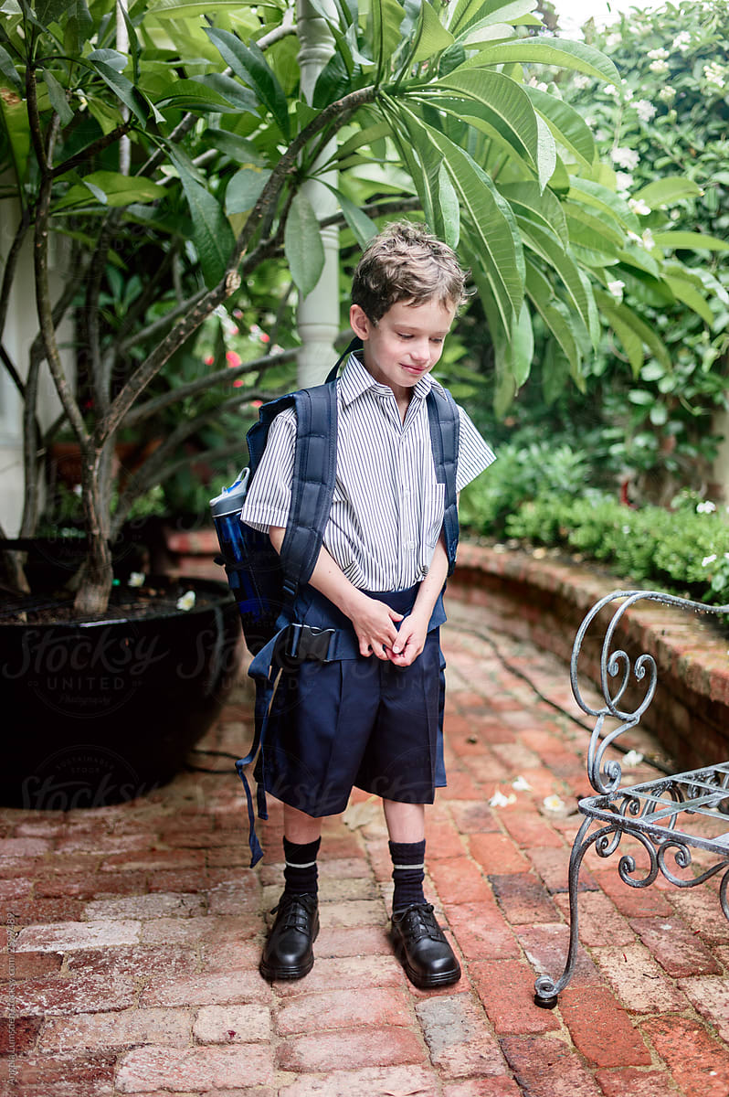 Boy in new school uniform at the start of a new school year
