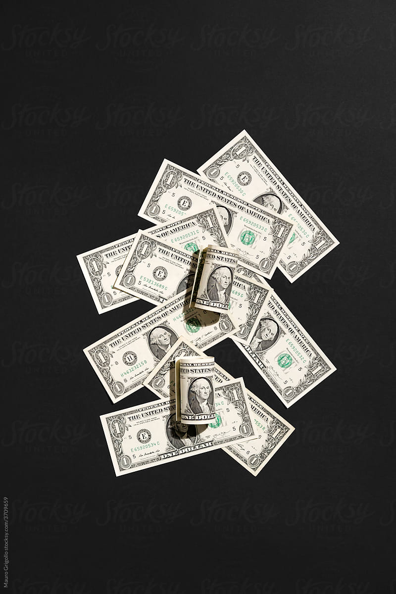 US Dollar Bills On a Black background