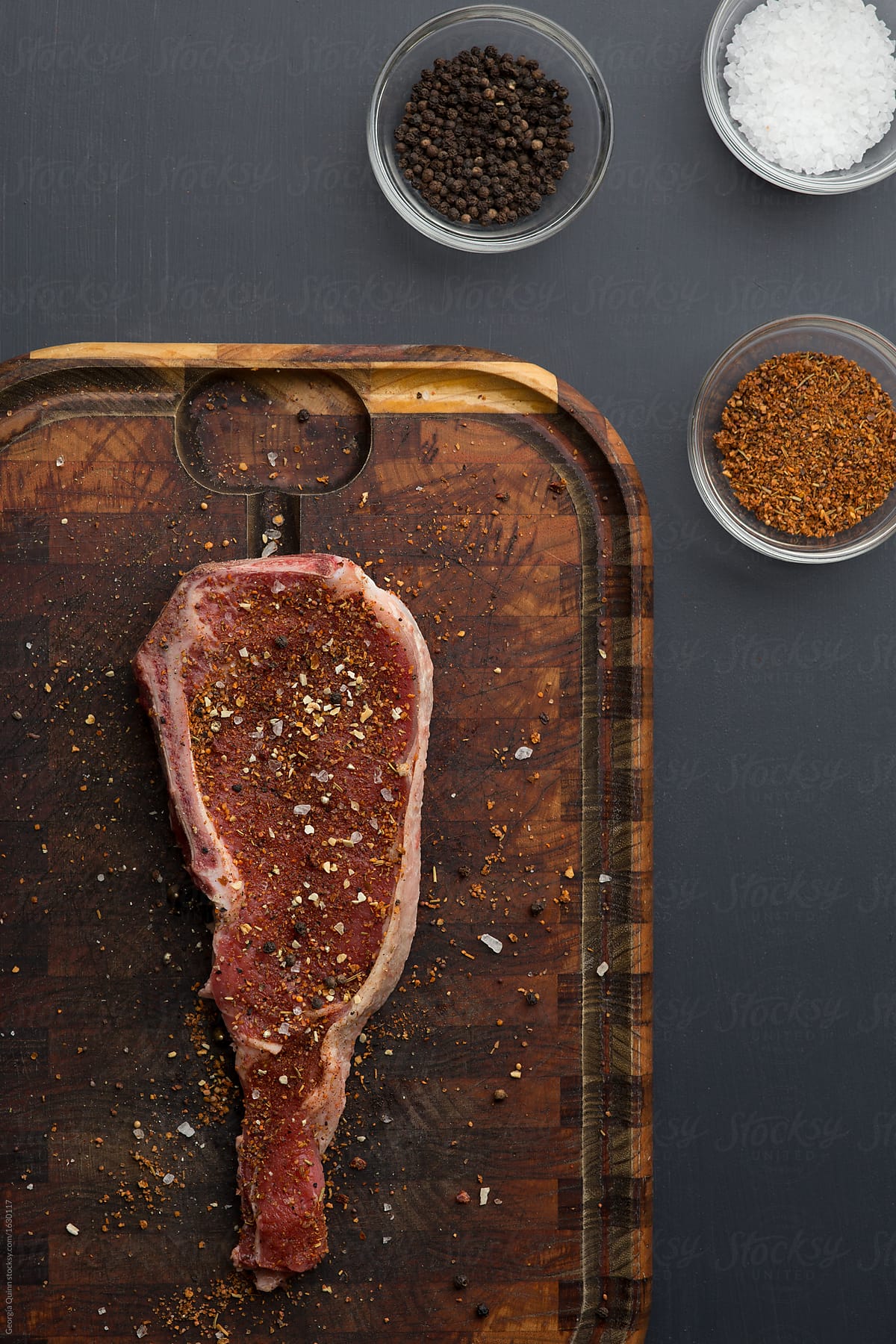 Raw Meat Steak on Chopping Board