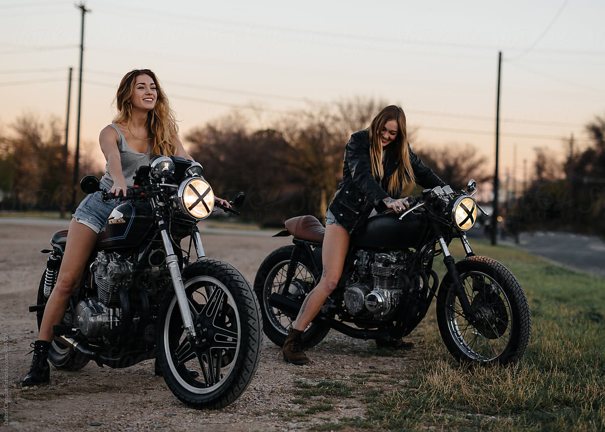 Attractive girls riding vintage motorcycles