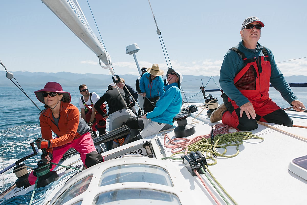 Crew on a racing sailboat or yacht