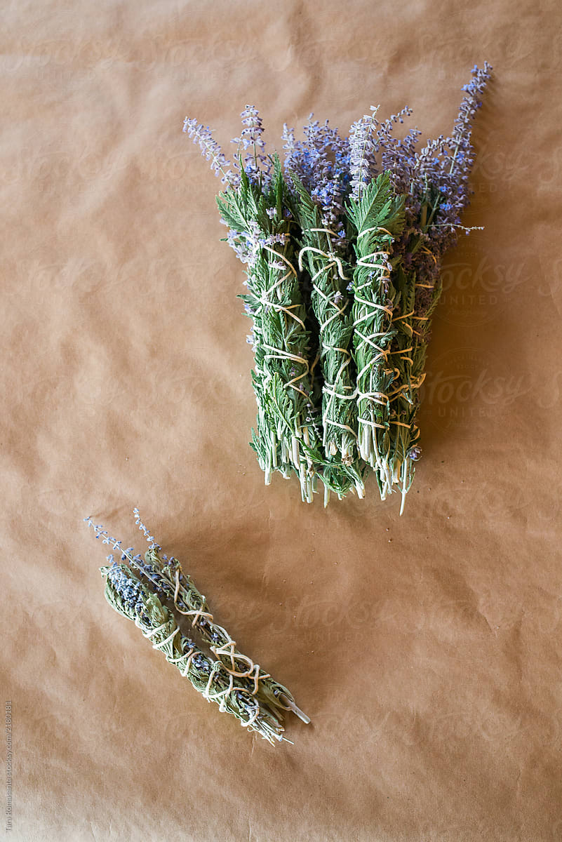 freshly bound sage bundles to dry and become smudge sticks