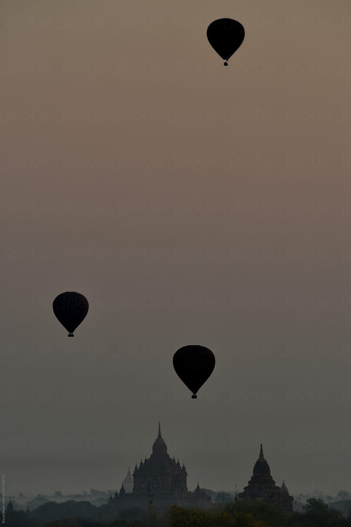Balloons flying over Bagan at sunrise