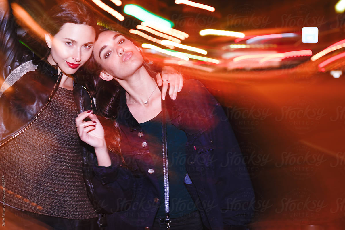 Women Together In Night City Comfort Friends By Stocksy Contributor Guille Faingold Stocksy