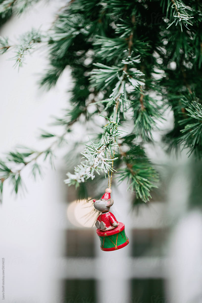 Christmas ornament on snowy tree