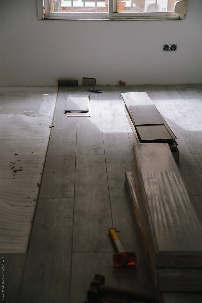Unfinished flooring in room of under construction house