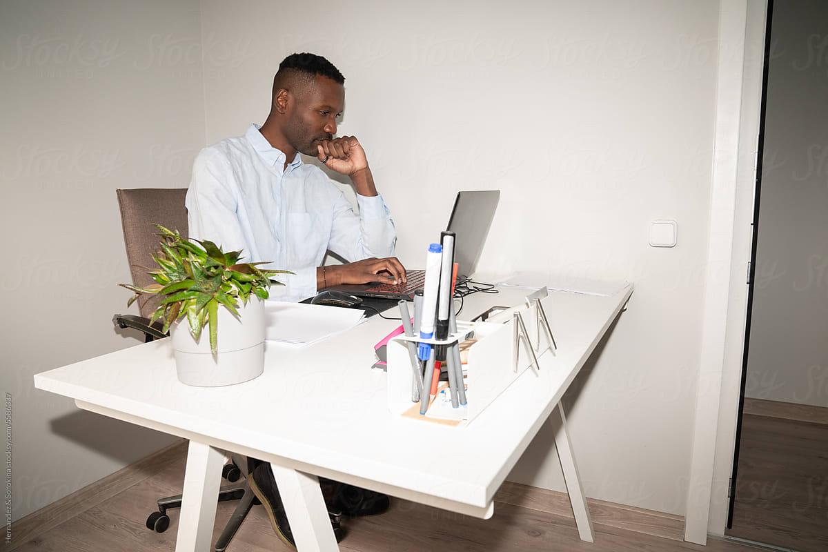 Black Man Working At Office Room