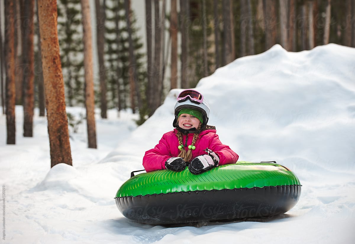 Girl Smiling After A Fun Toboggan Ride By Angela Lumsden