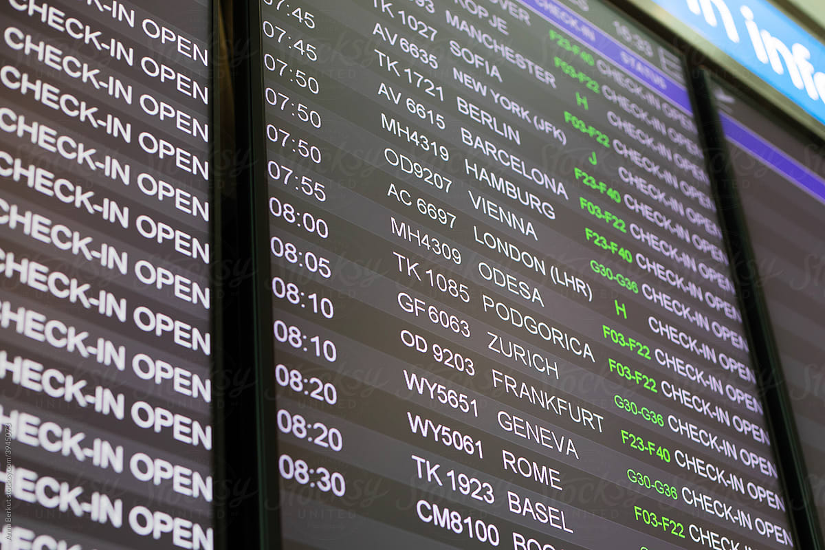 airport screen with departure flights to Europe