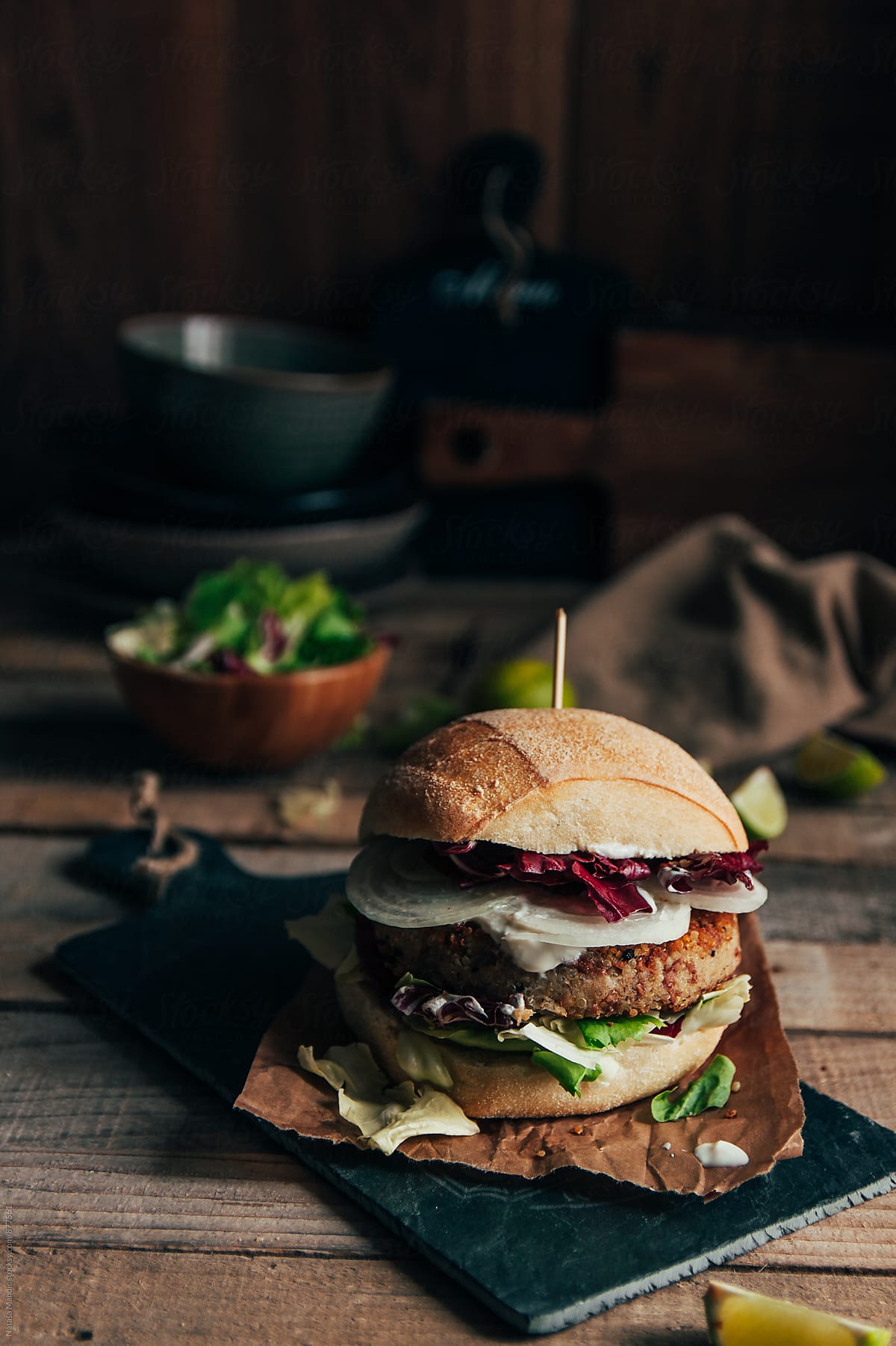 Quinoa burger with salad and onion