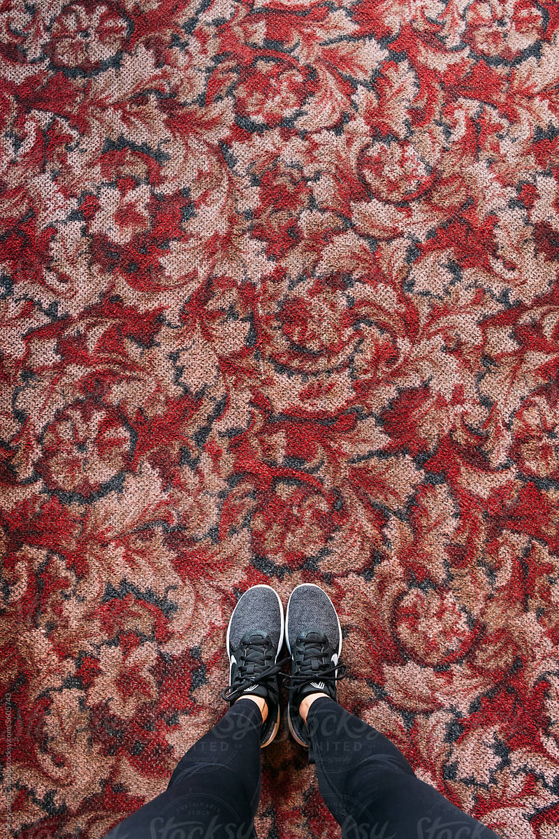 POV Standing on Old Ornate Carpet