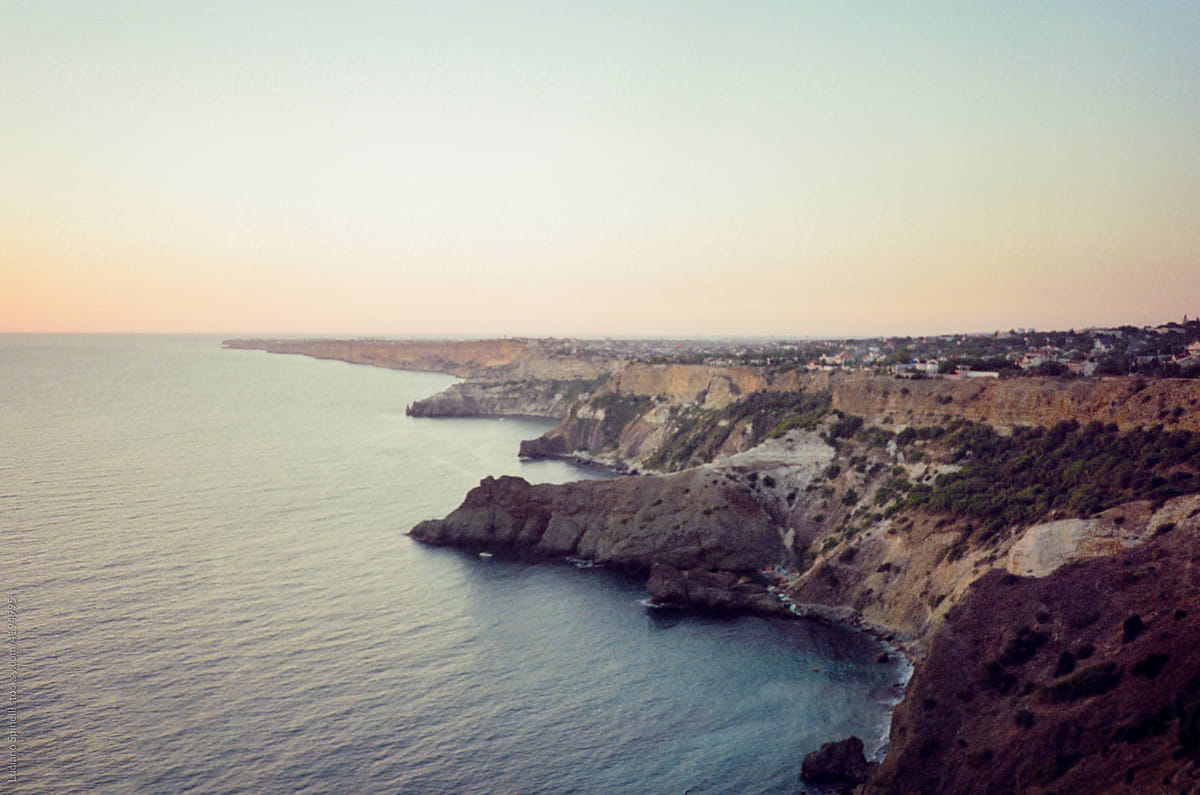 Cliffs and the sea during a summer sunset