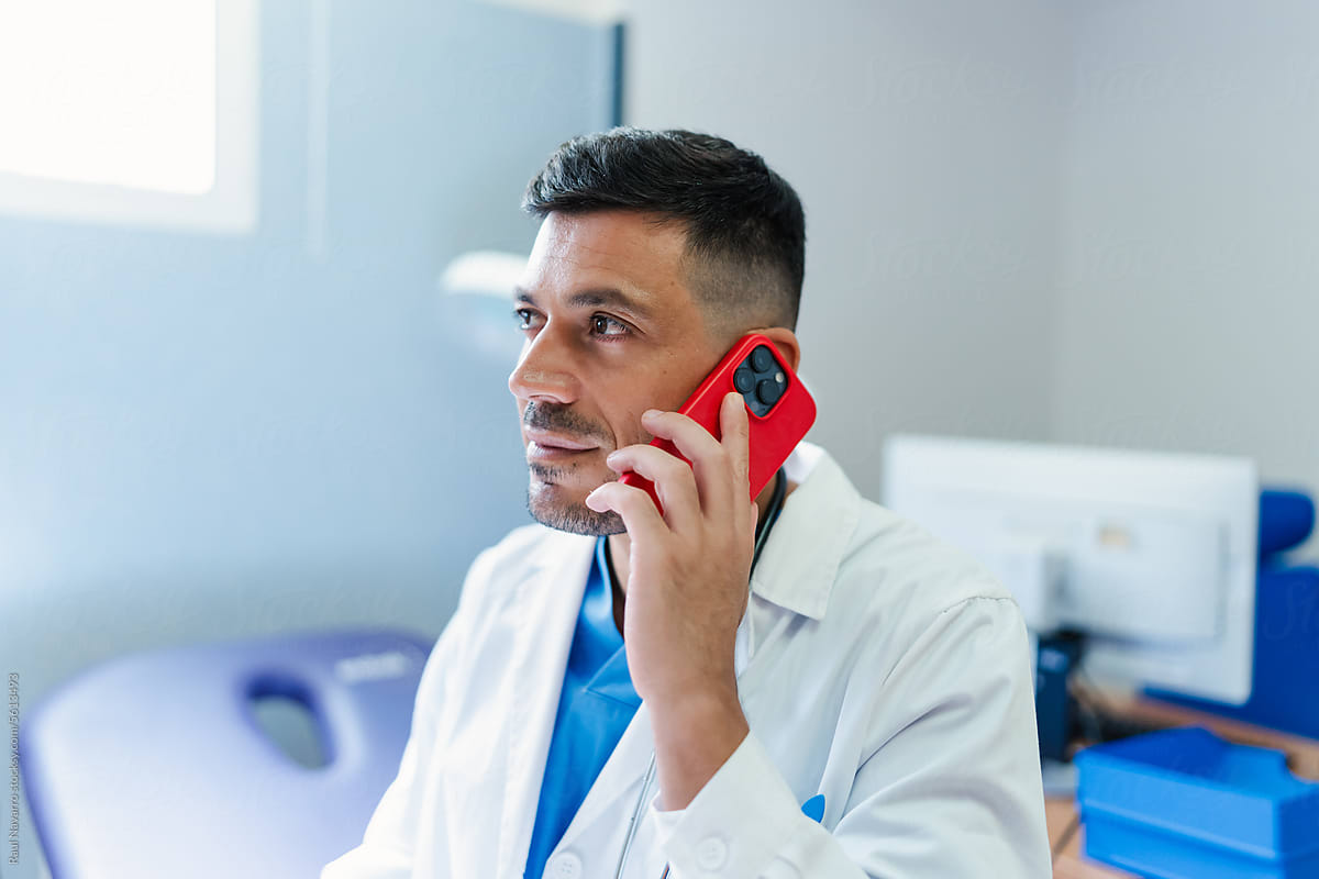 close-up portrait of a doctor talking on the phone