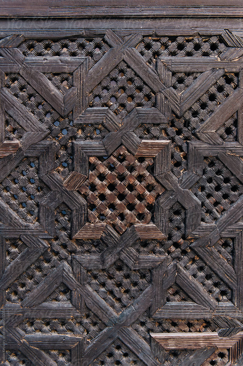 Traditional ornate carved on the wooden door in morocco