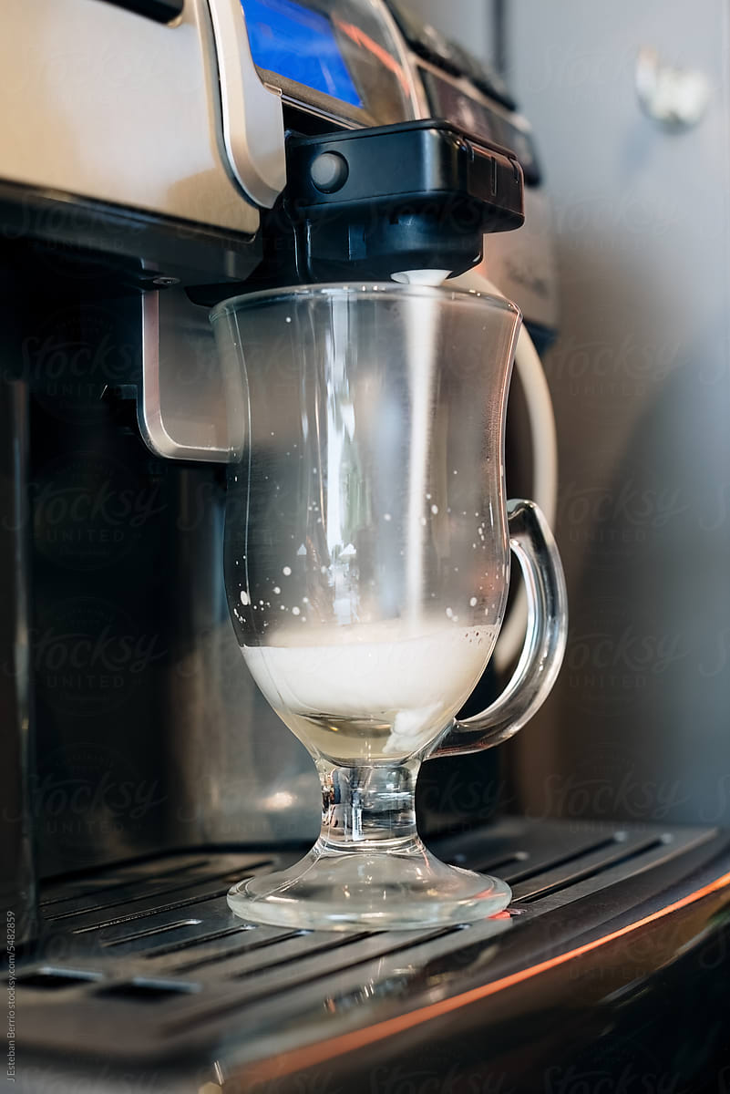 Coffee machine making a cappuccino