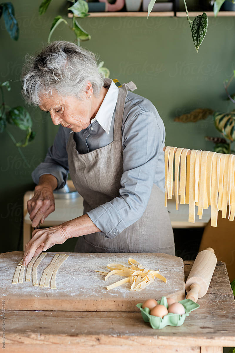 Woman Preparing Homemade Tagliatelle