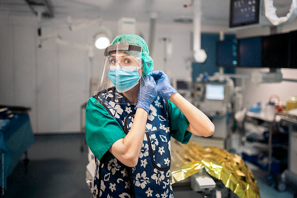 Portrait of Nurse Using Face Mask in Surgery Room